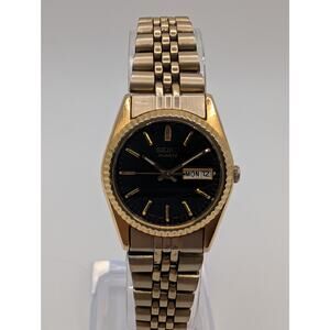 Seiko Quartz 7N83 Gold Tone Day Date Women’s Watch